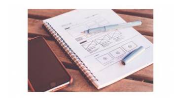 Bild von Stift und Papier zur Illustration der Methode